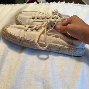 cream canvas shoes